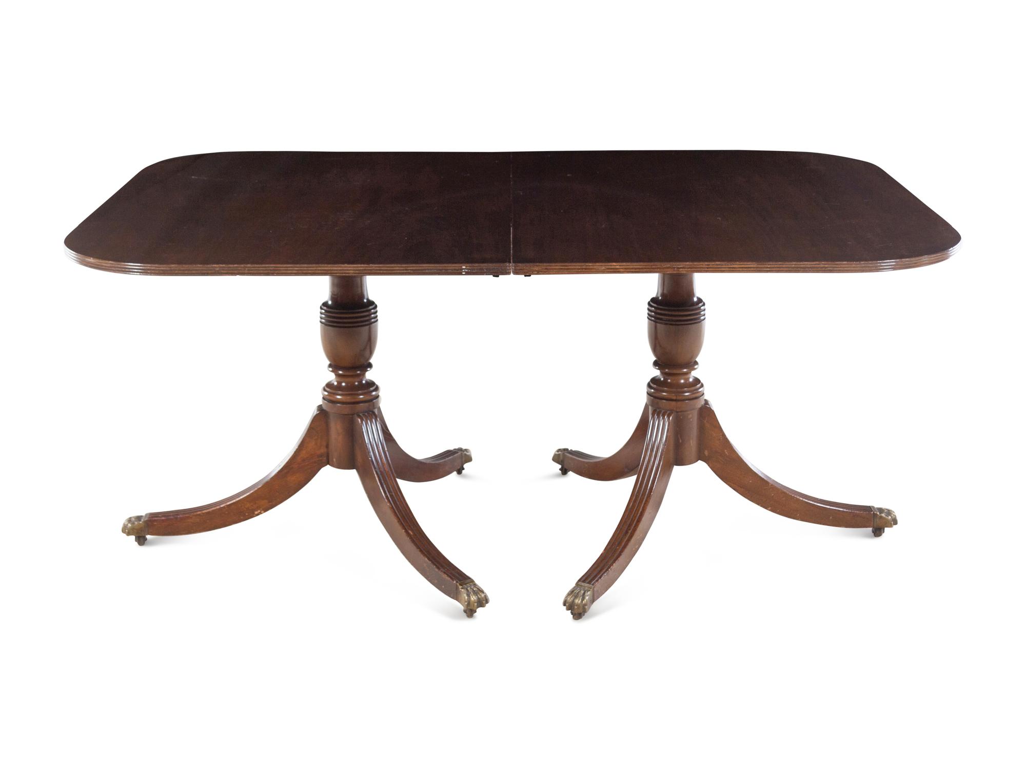 A Regency Style Mahogany Double-Pedestal Dining Table