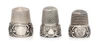 A Pair of American Silver Grapevine Thimbles, Simons Bros., Philadelphia, PA, each having a knurled top and body above a grape cluster