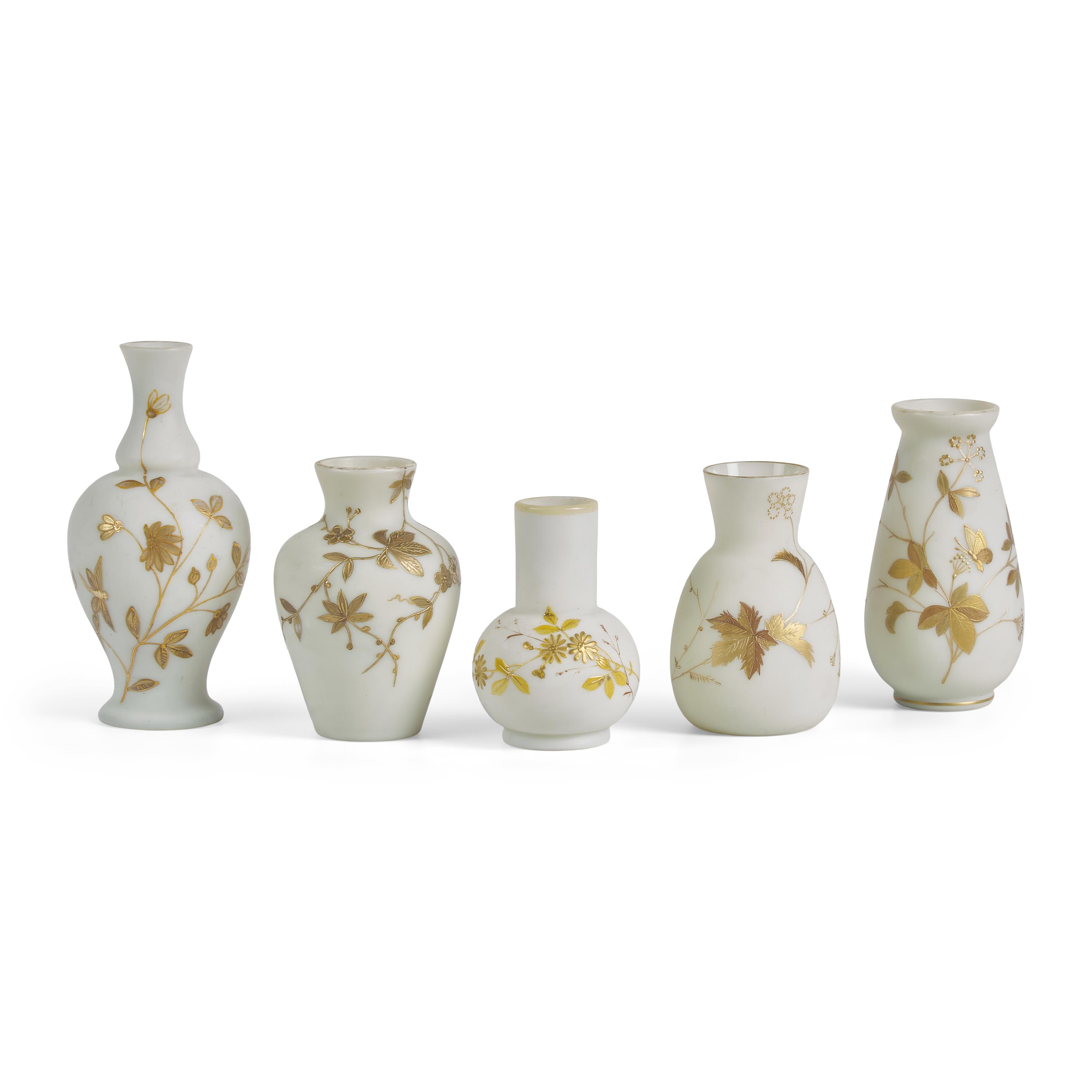 A Set of Five Thomas Webb Parcel-Gilt Milk Glass Holloware