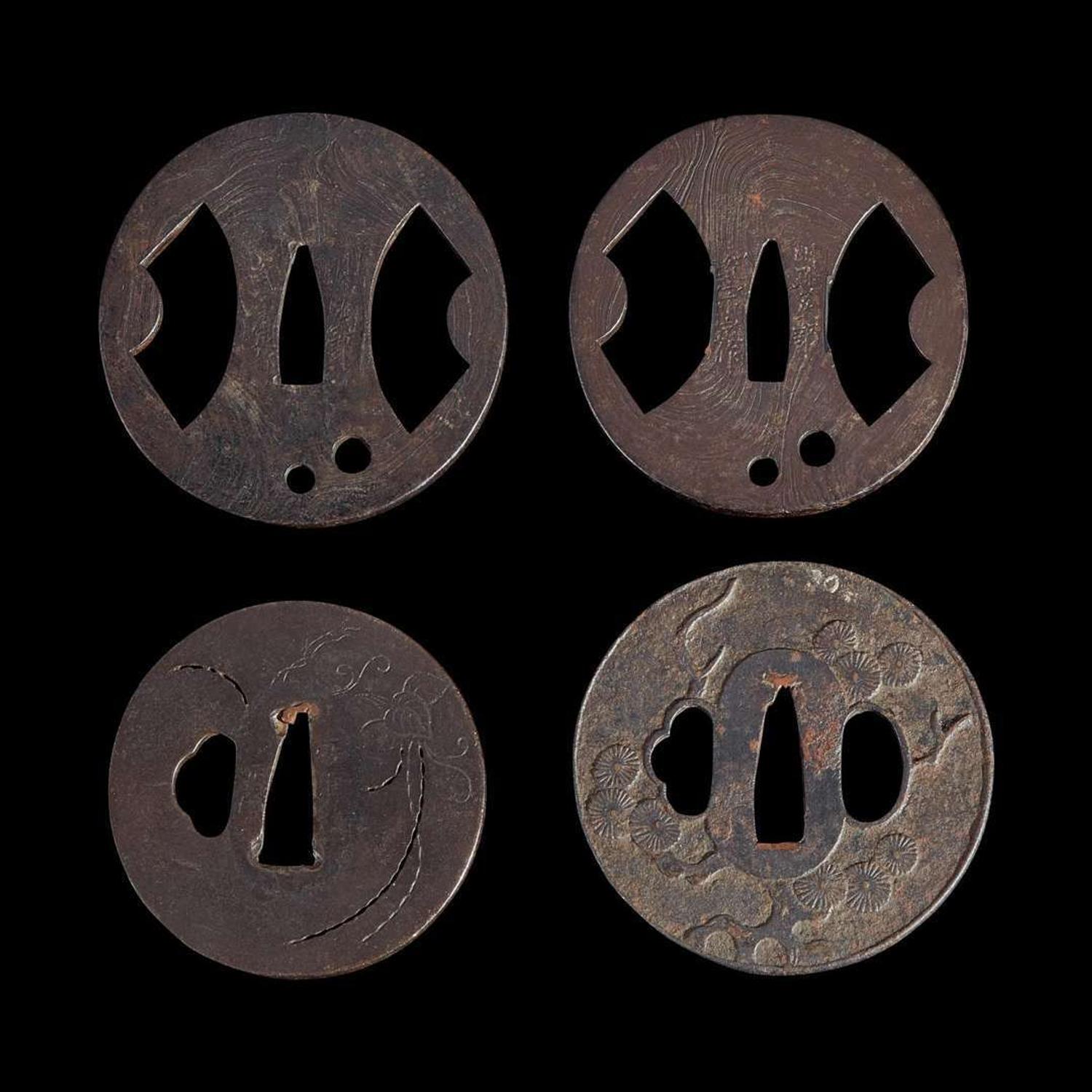 Group of nine Japanese tsuba Meiji period and earlier