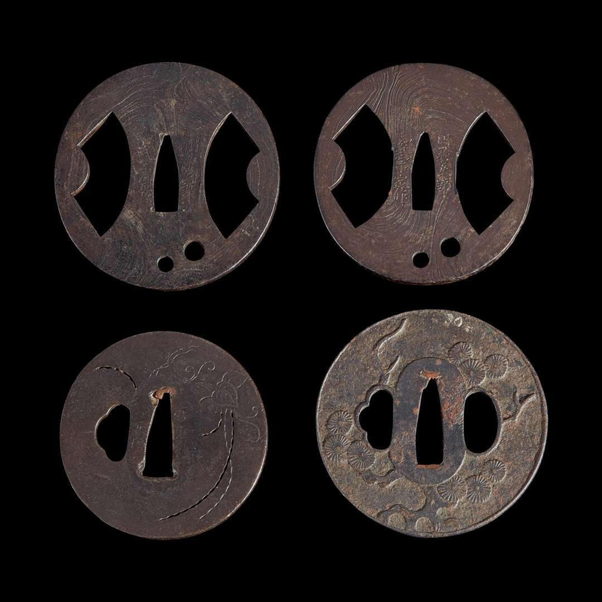 Group of nine Japanese tsuba Meiji period and earlier