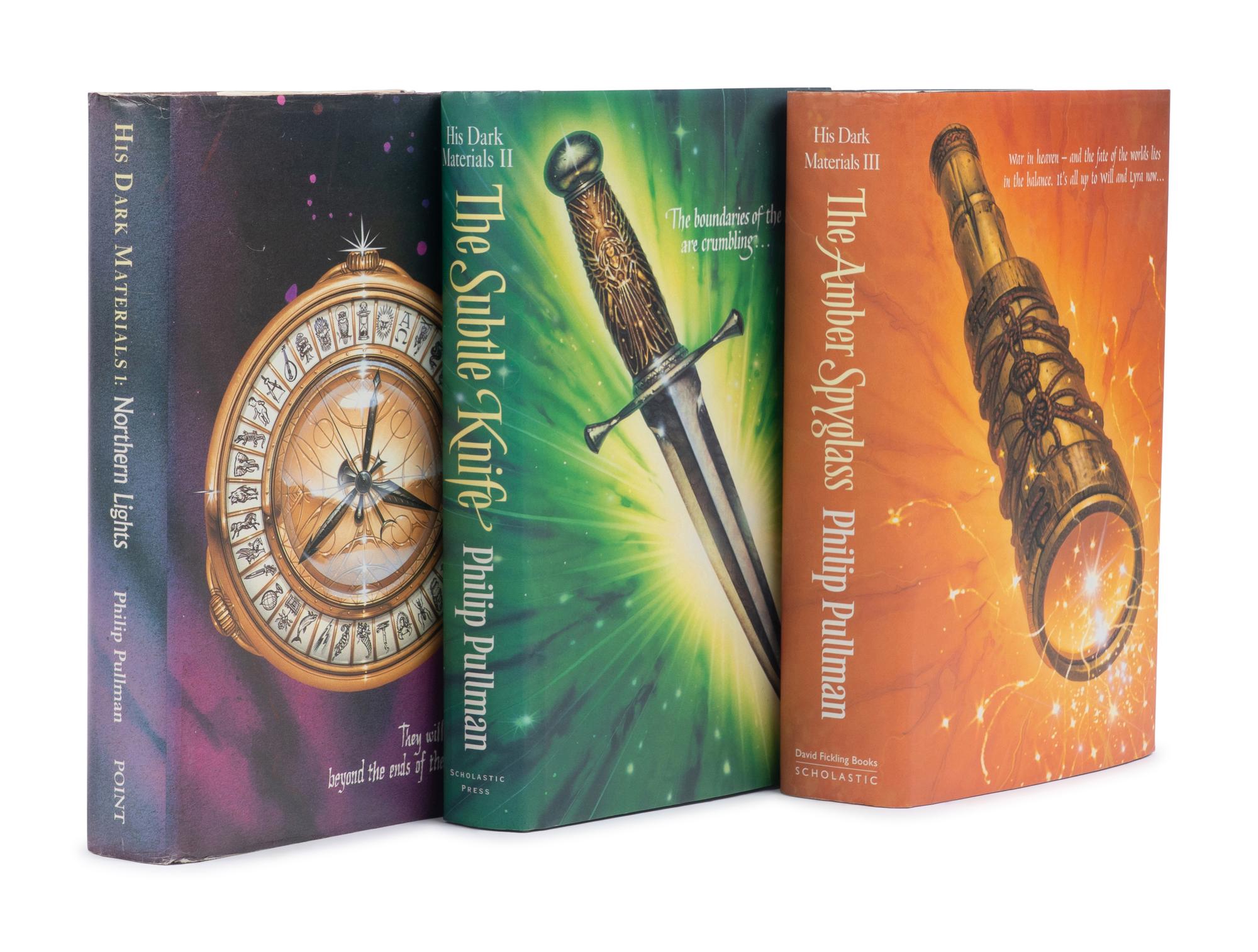PULLMAN, Philip (b.1946). [His Dark Materials trilogy:] Northern Lights . 1995. - The Subtle Knife . 1997. - The Amber Spyglass . 2000. London: Scholastic.