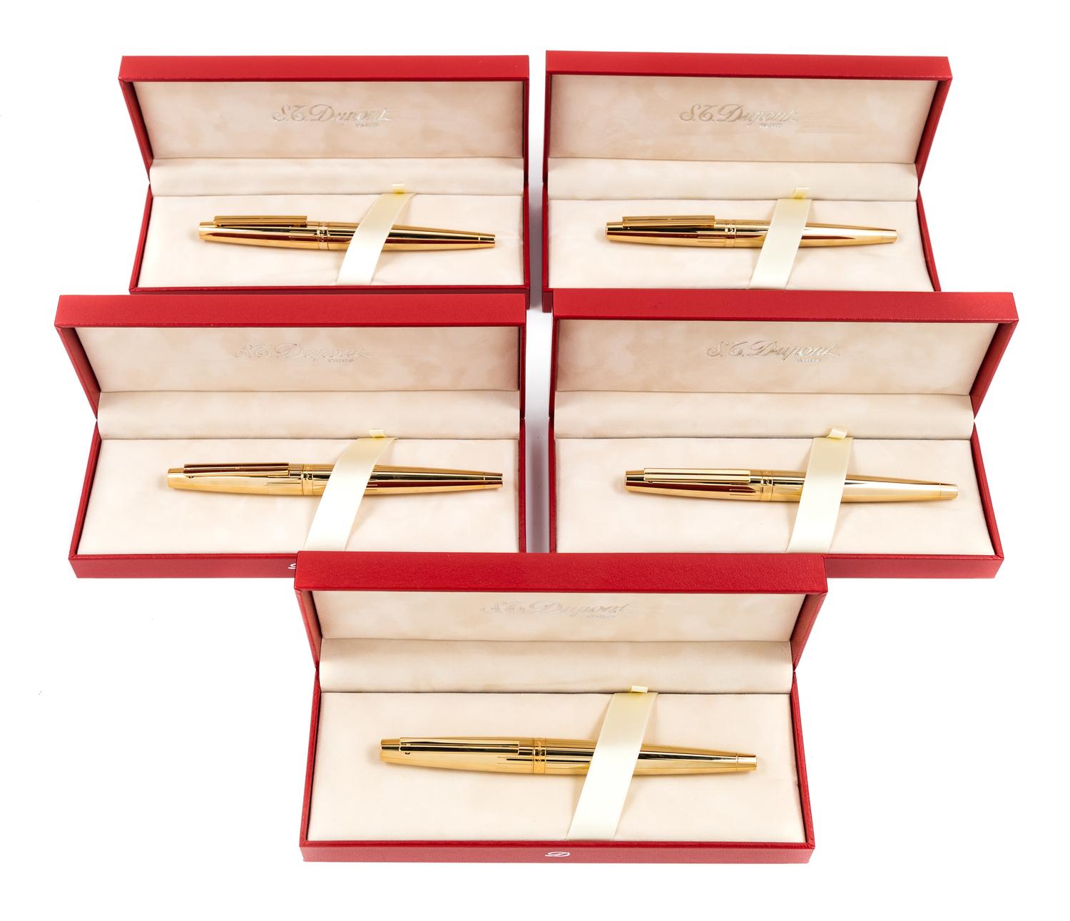 A Group of Five S.T. Dupont Gold-Plated Ellipsis Fountain Pens