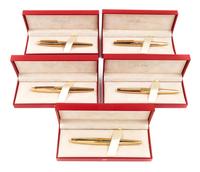 A Group of Five S.T. Dupont Gold-Plated Ellipsis Fountain Pens