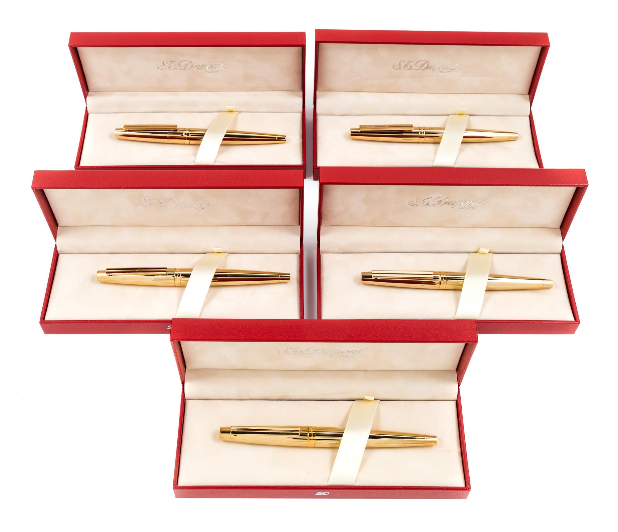 A Group of Five S.T. Dupont Gold-Plated Ellipsis Fountain Pens
