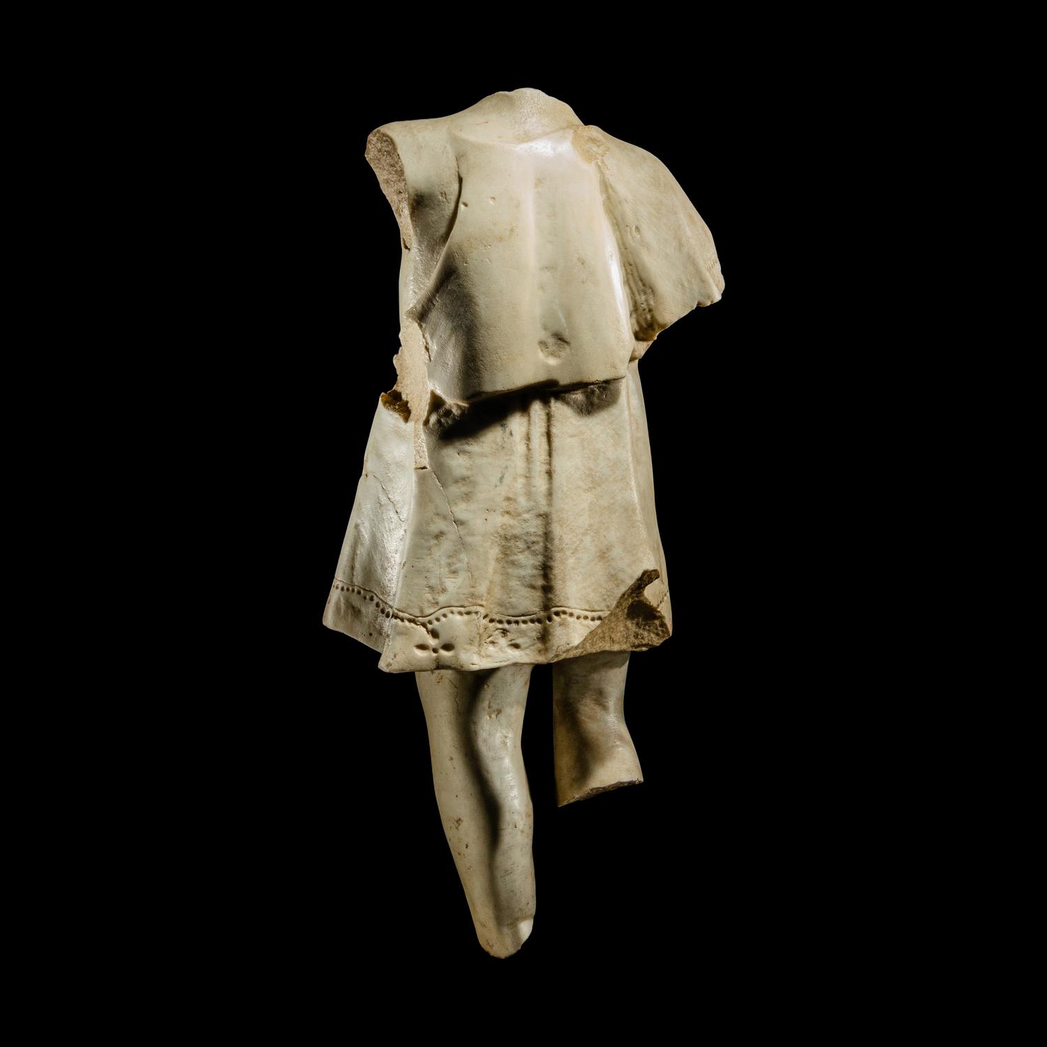 A Roman Style Marble Torso of a Child