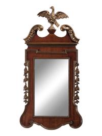 A Chippendale Style Parcel Gilt and Mahogany Looking Glass