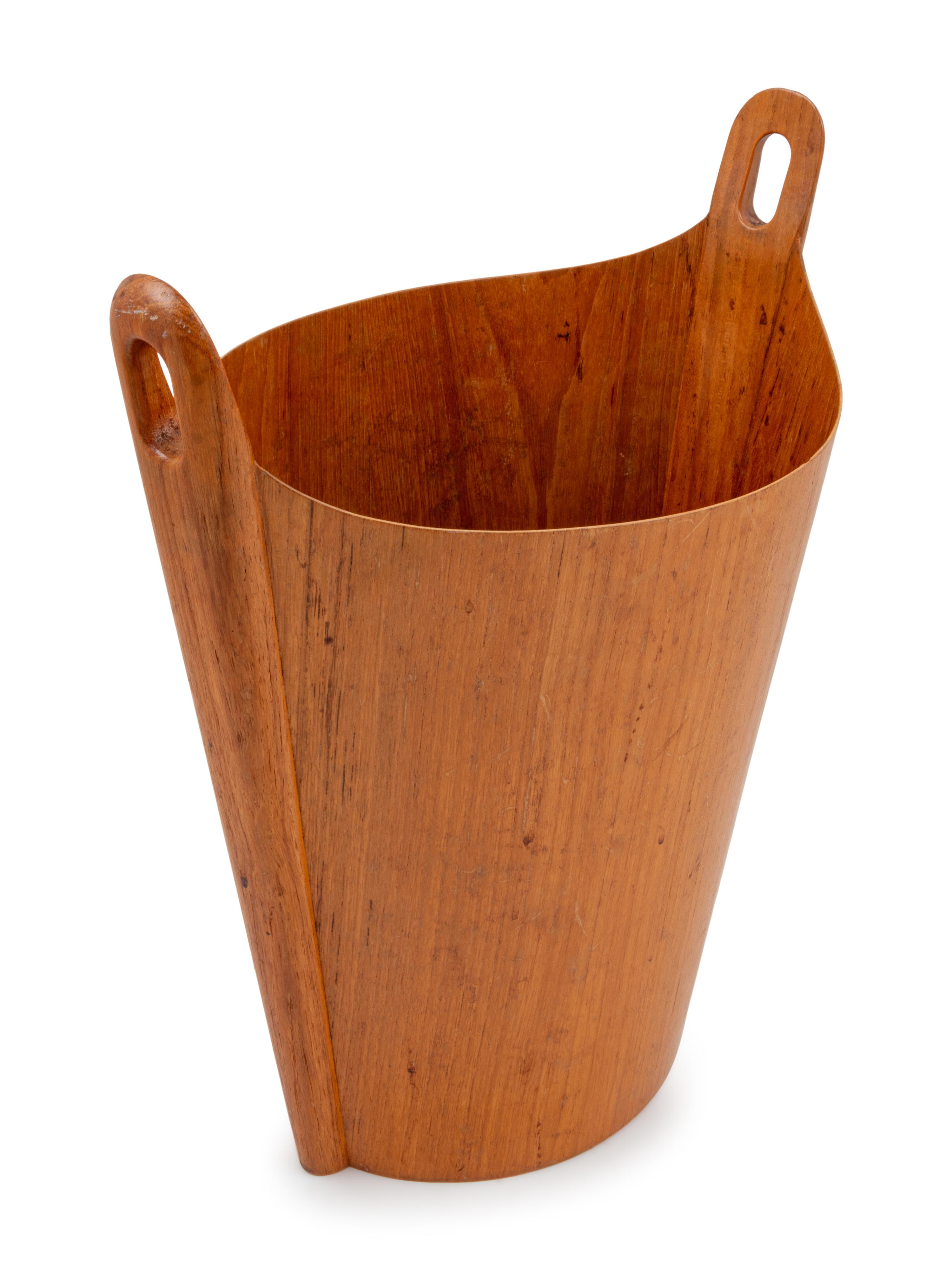 A Norwood Carved Teak Wastebasket
