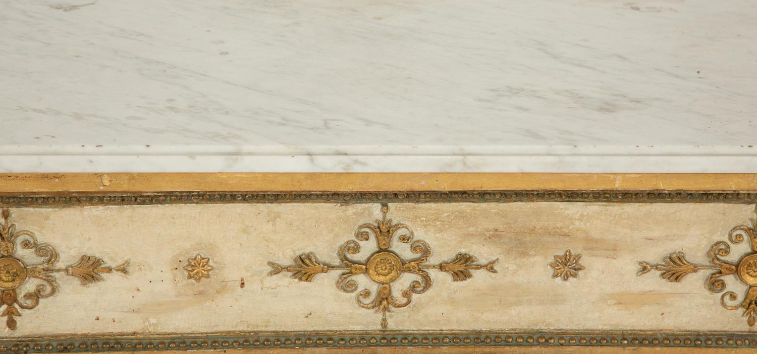 A Neoclassical Painted and Parcel Gilt Marble Top Console Table