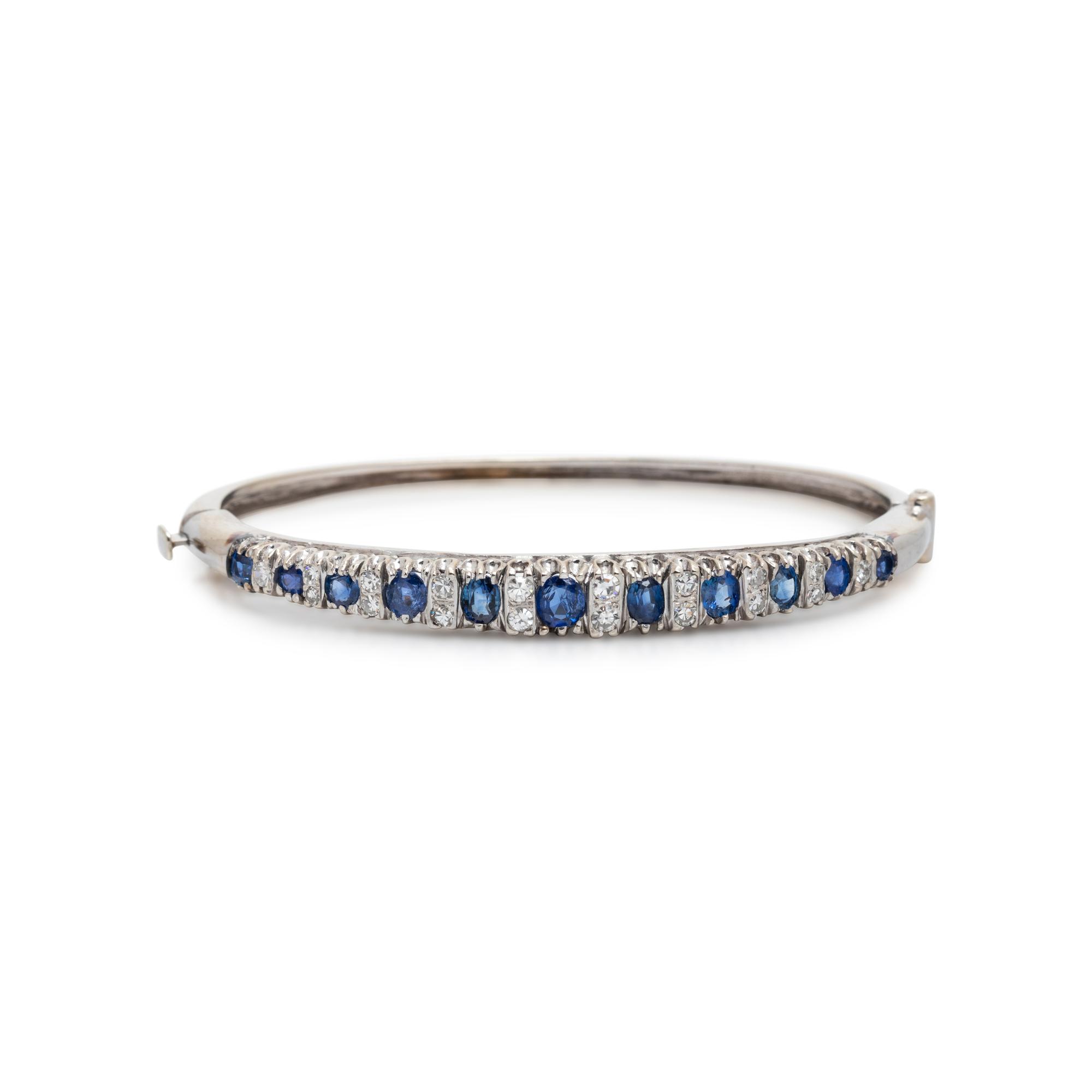 WHITE GOLD, SAPPHIRE AND DIAMOND BANGLE BRACELET