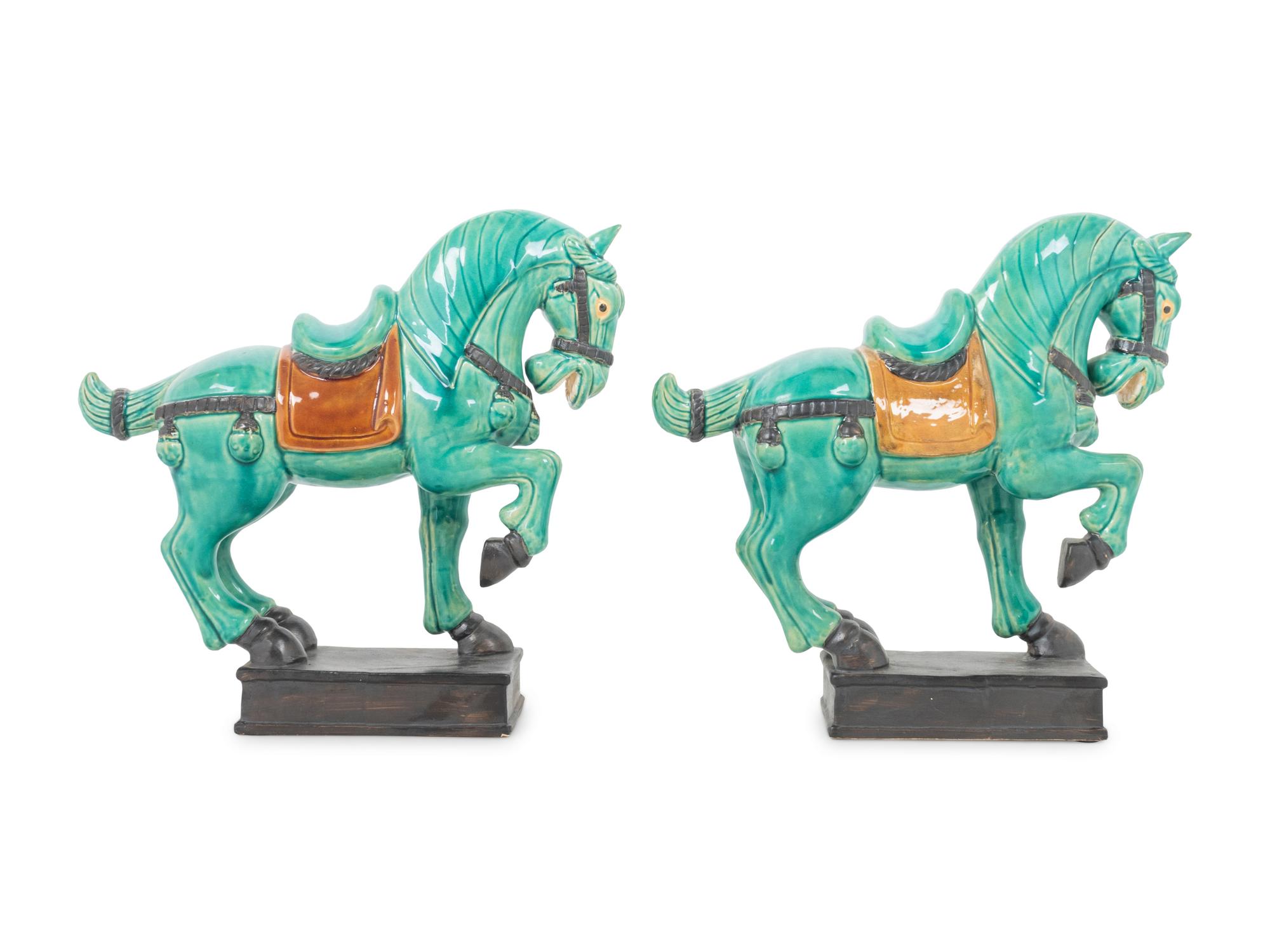 A Pair of Turquoise Glazed Pottery Horses