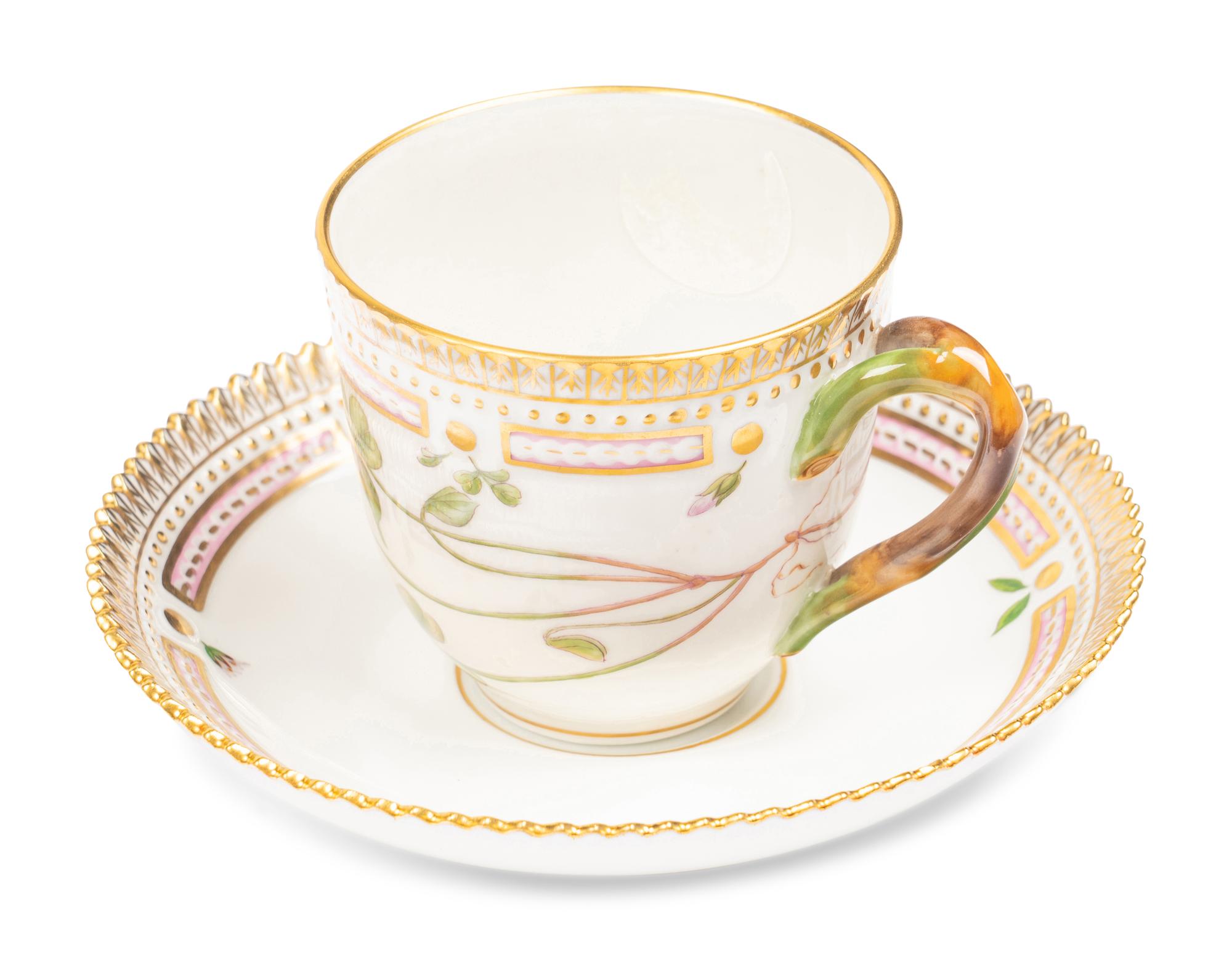 A Set of Nine Royal Copenhagen Flora Danica Porcelain Teacups and Saucers