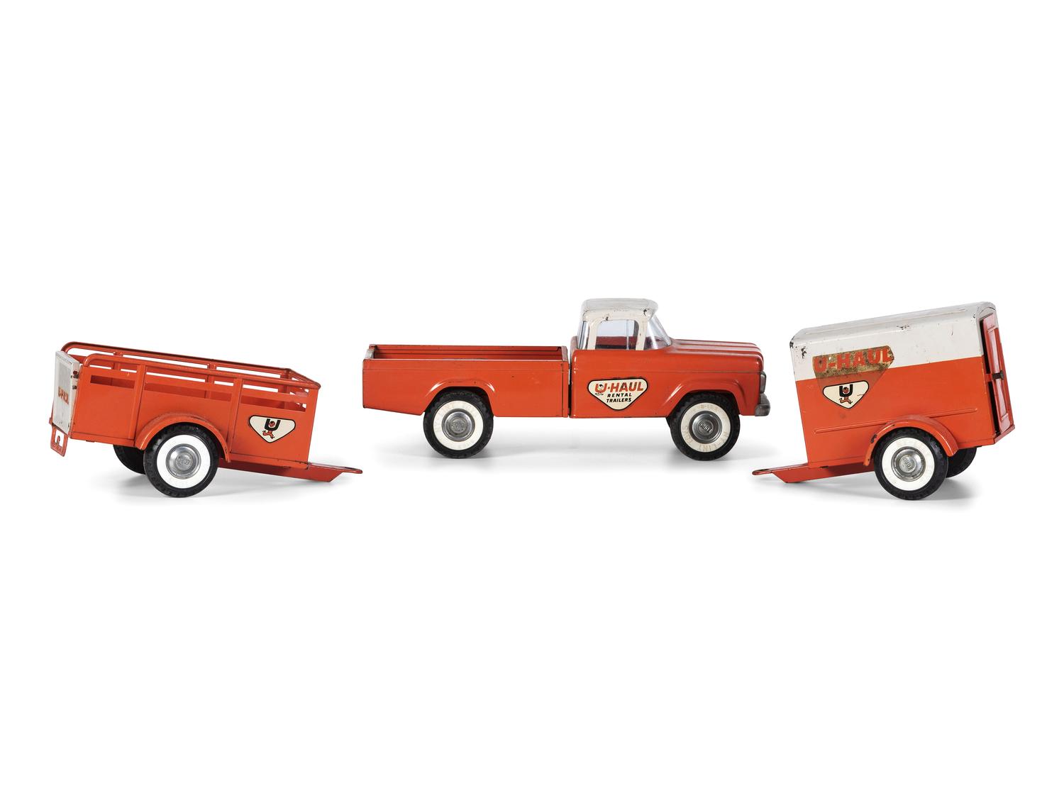 A Nylint 'U-Haul' Three Piece Toy Set