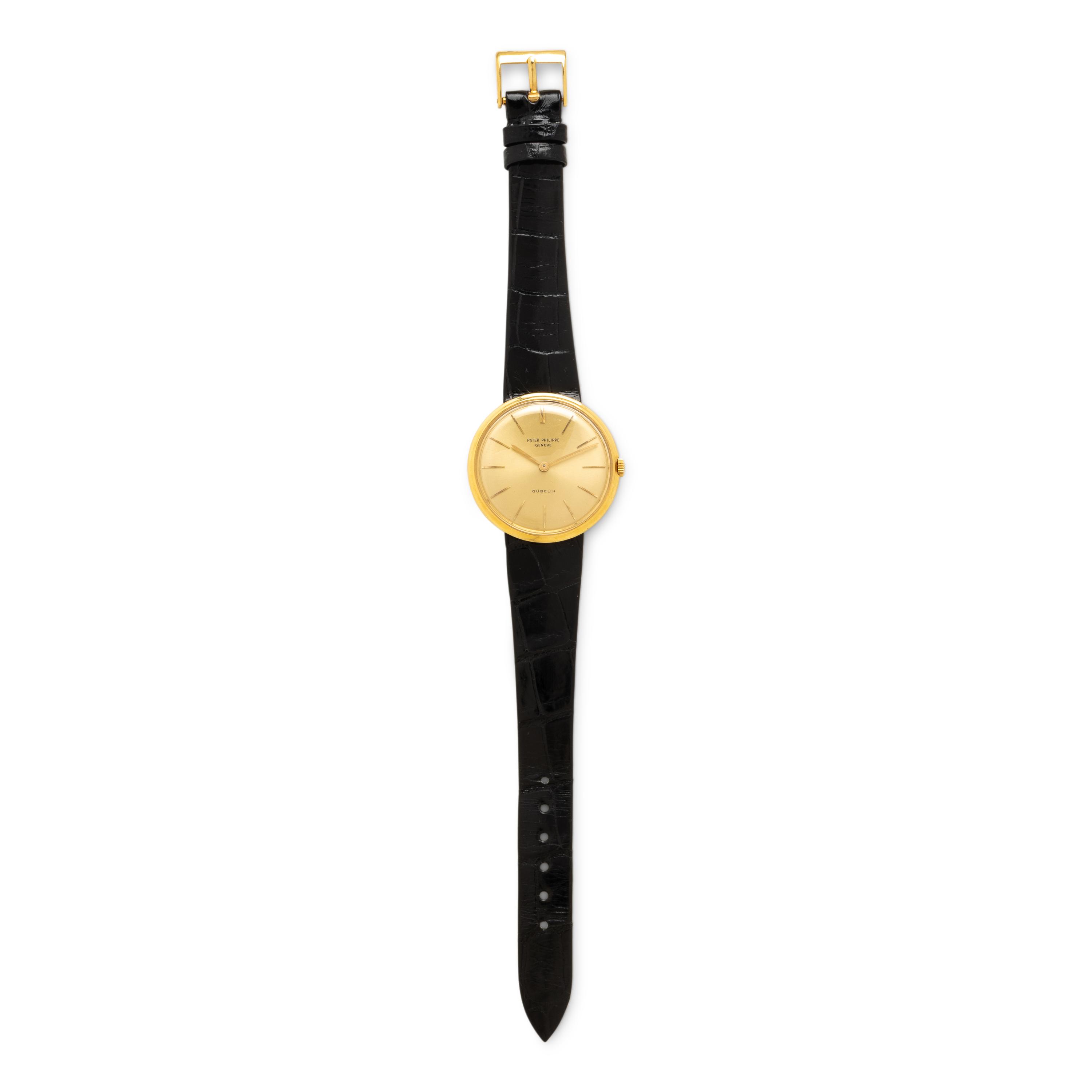 Patek Philippe, Ref. 2591, 18K Yellow Gold 'Calatrava' Watch, Retailed by and Signed Gübelin, with Pouch