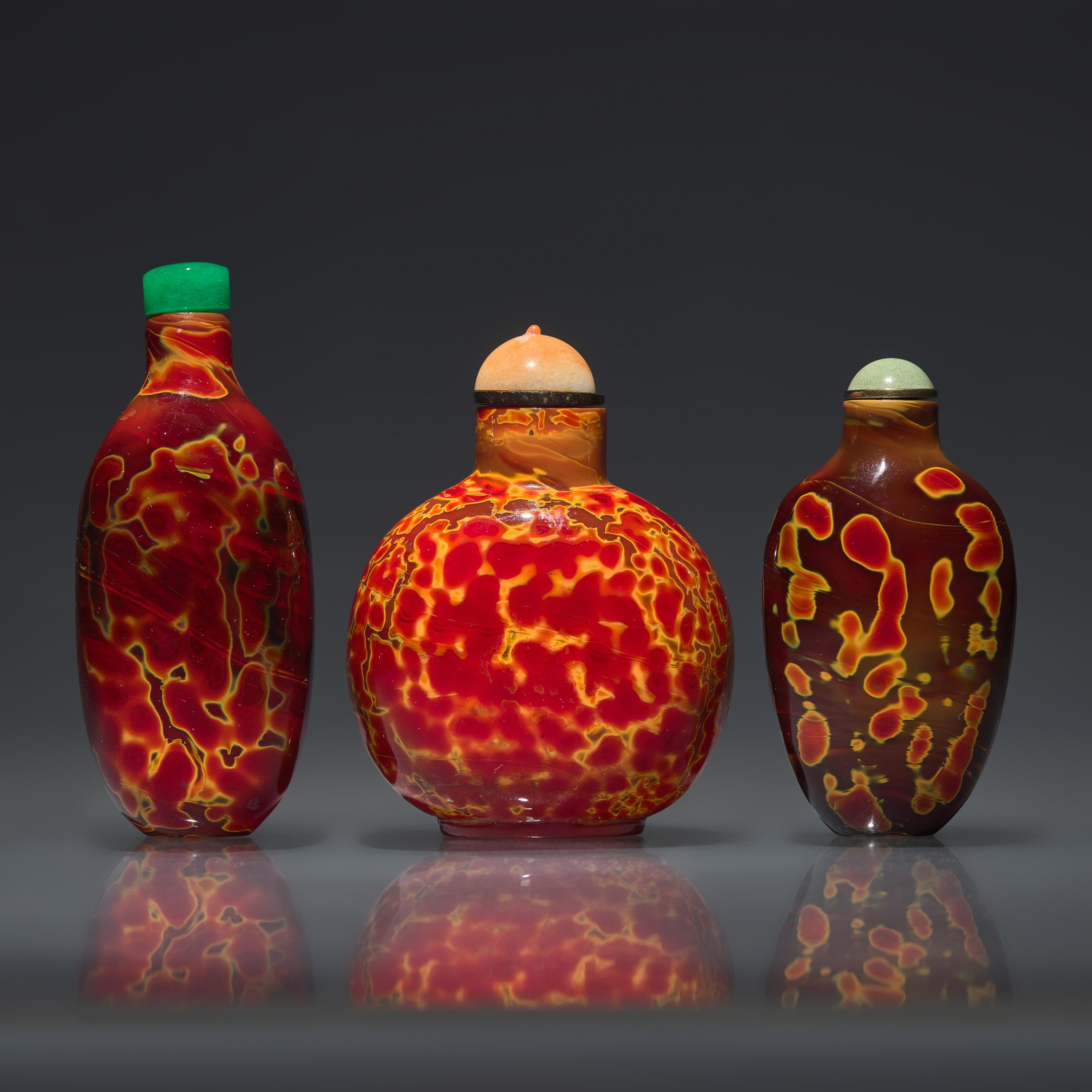 Three Chinese "Realgar" Glass Snuff Bottles, Qing Dynasty, 18th-19th Century — 清中期 雄黃料鼻煙壺三支