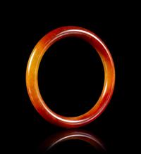 A Chinese Russet Jadeite Bangle