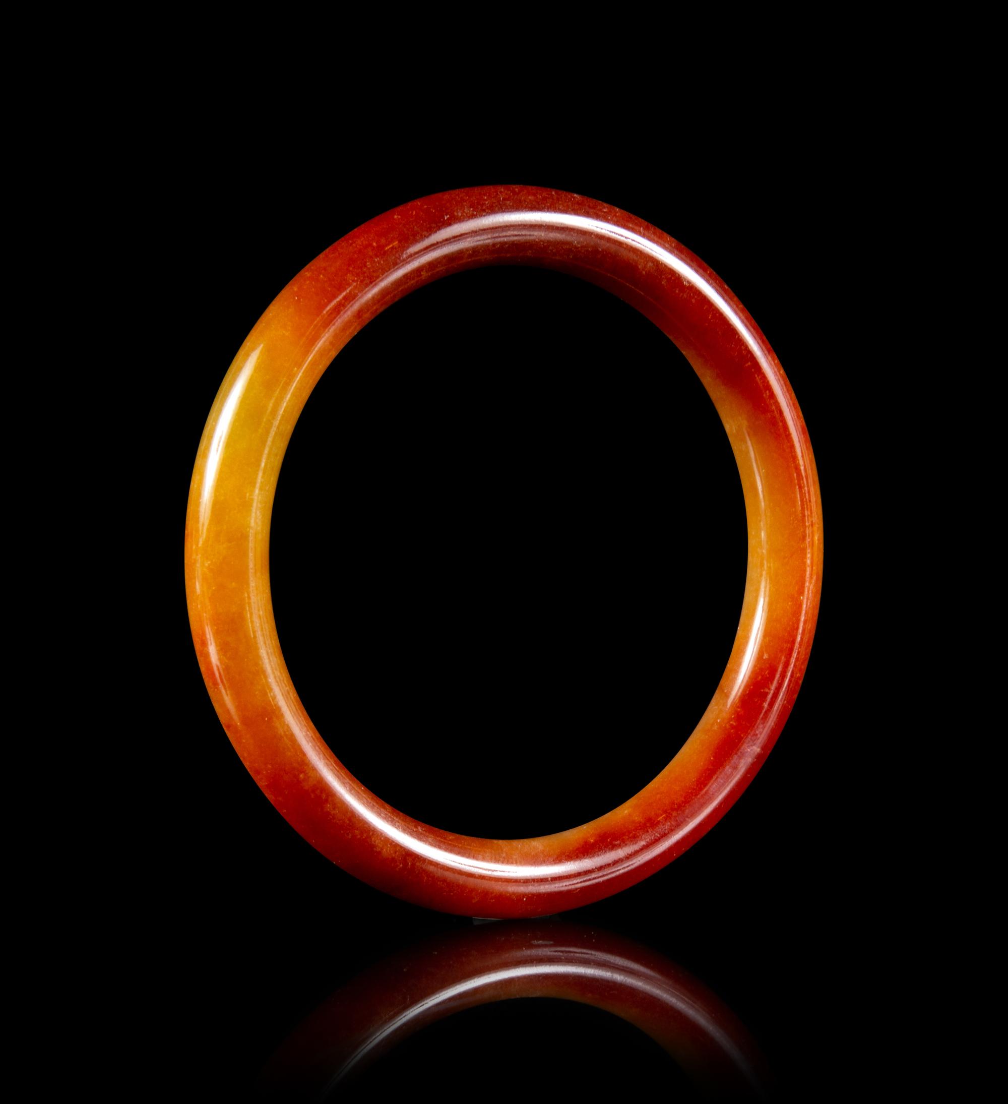 A Chinese Russet Jadeite Bangle