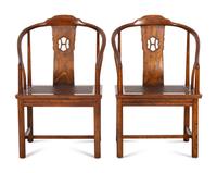 A Pair of Ming Style Horseshoe Back Armchairs
