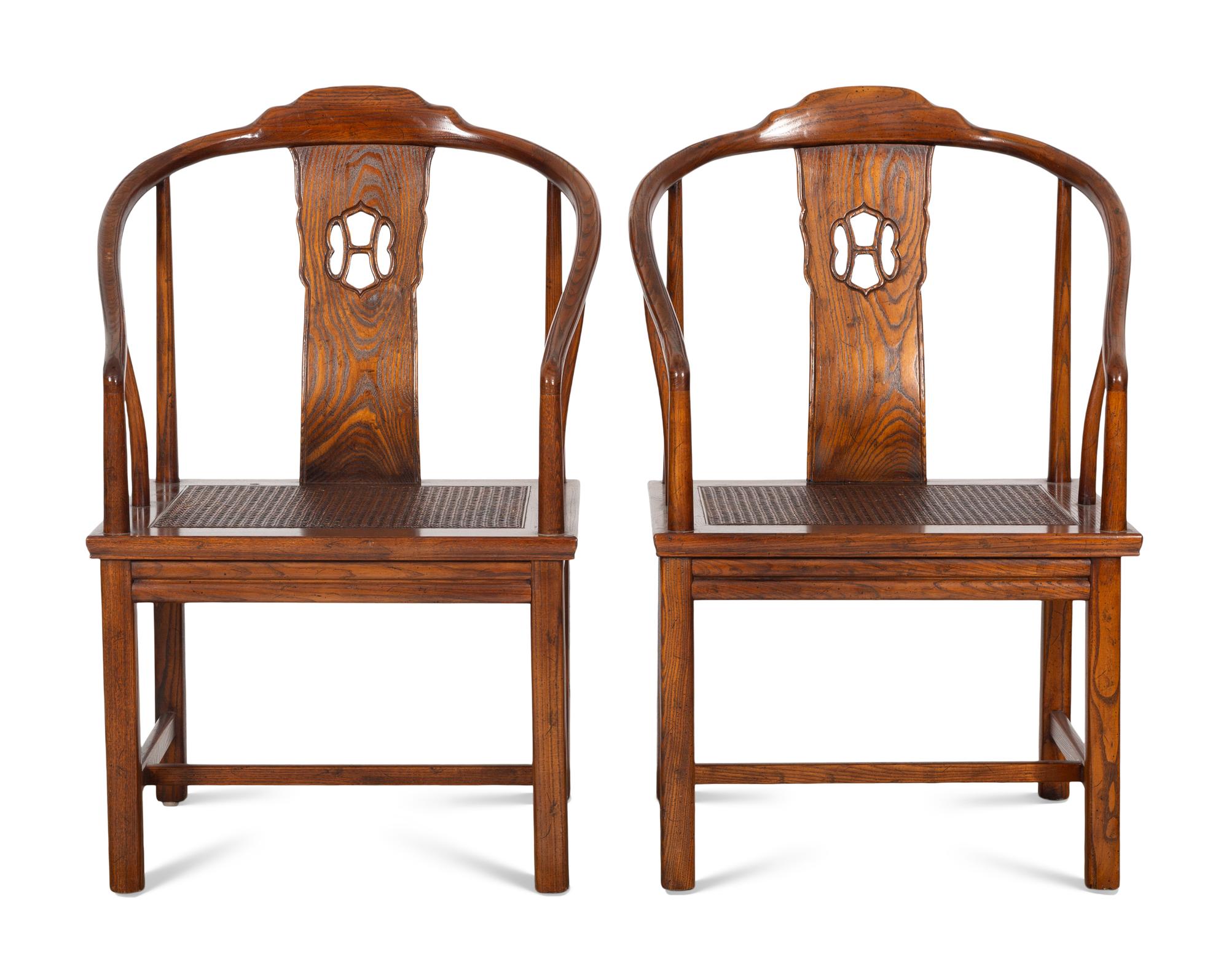A Pair of Ming Style Horseshoe Back Armchairs