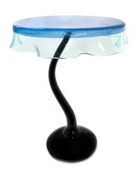 An Italian Glass Side Table Height 28 1/2 x diameter 24 inches.