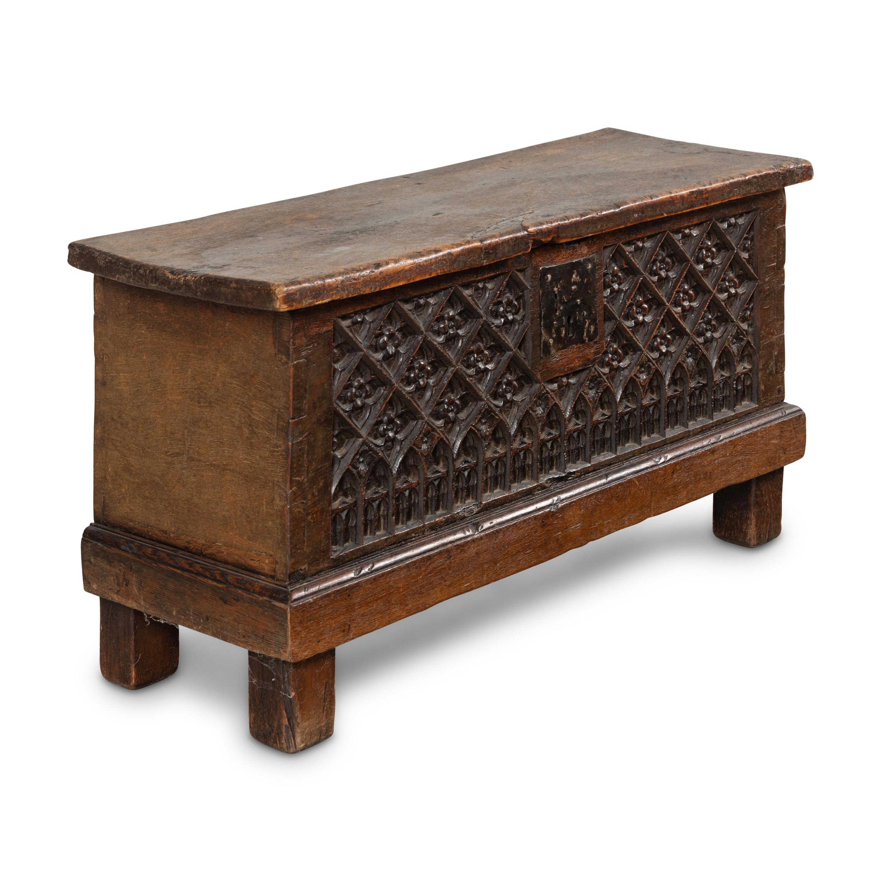 A Gothic Carved Walnut Chest