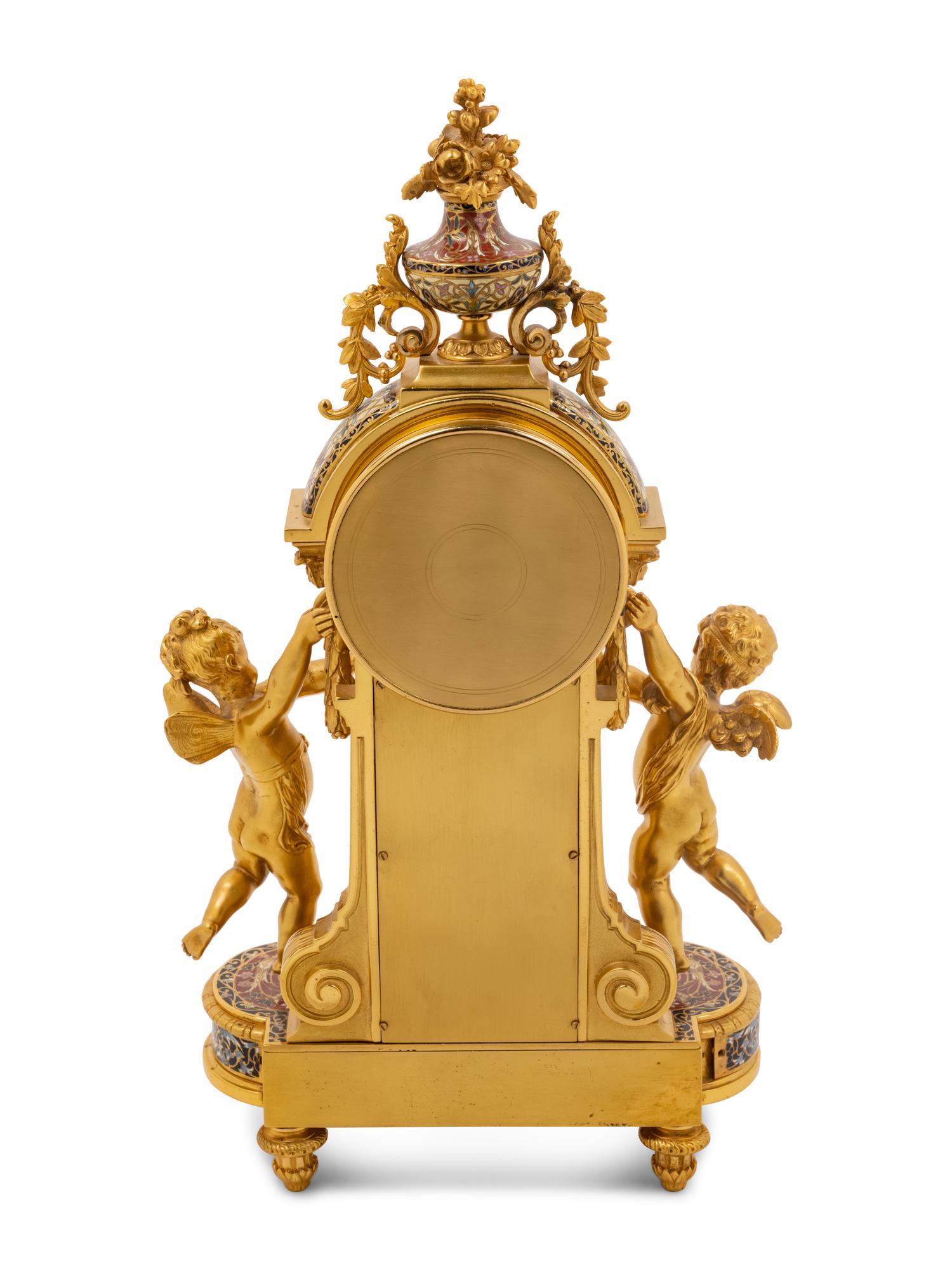 A French Gilt Bronze and Champlevé Clock Garniture Retailed by Tiffany and Co.