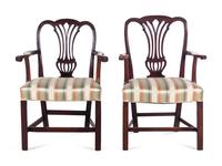 A Pair of George III Carved Mahogany Armchairs