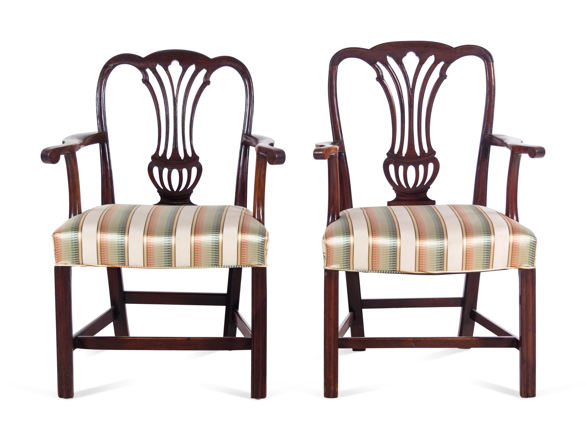 A Pair of George III Carved Mahogany Armchairs
