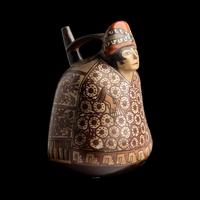 A Nazca-Huari Seated Figure Vessel