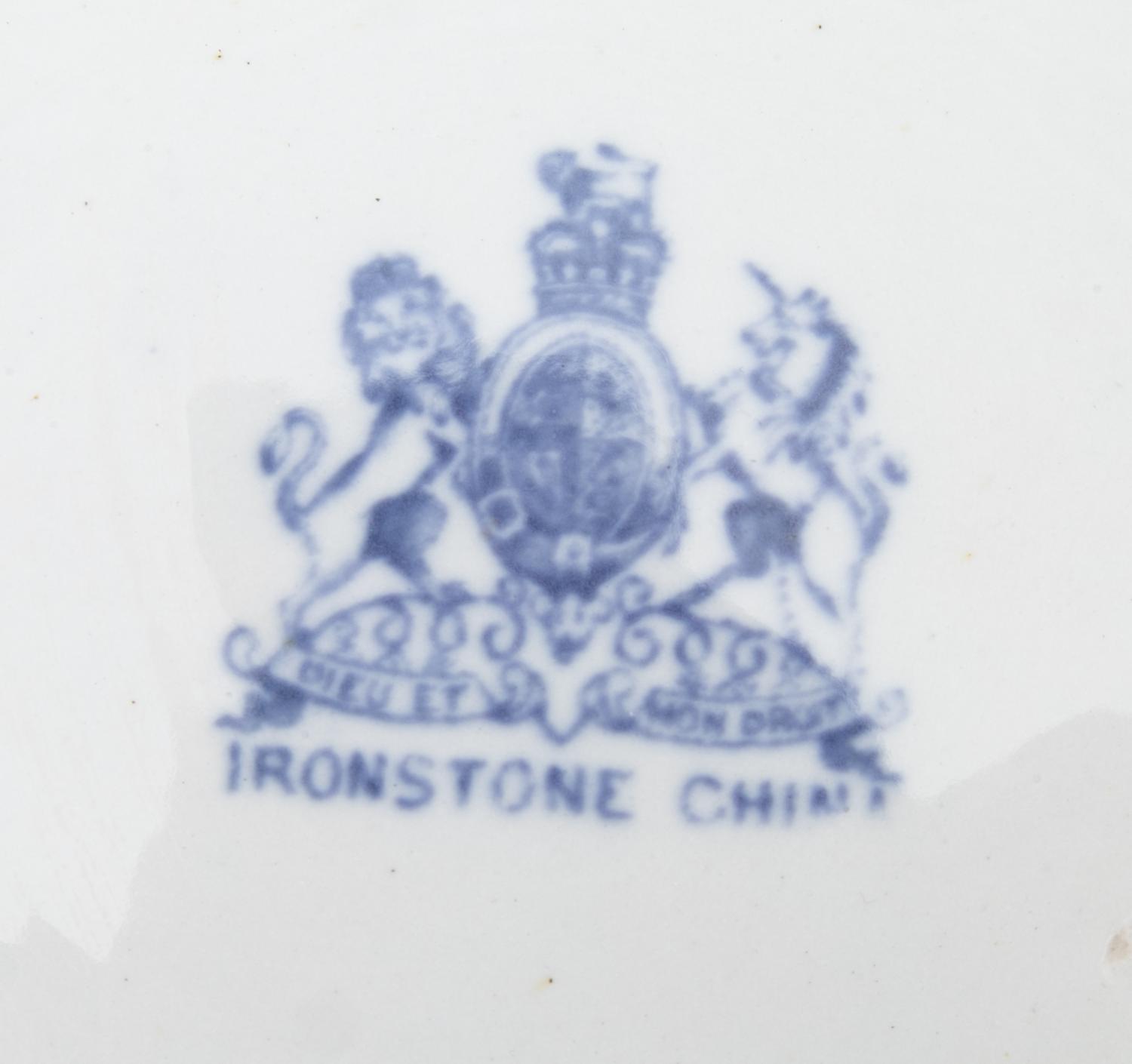 A Pair of English Ironstone Painted and Parcel Gilt Chamber Pots