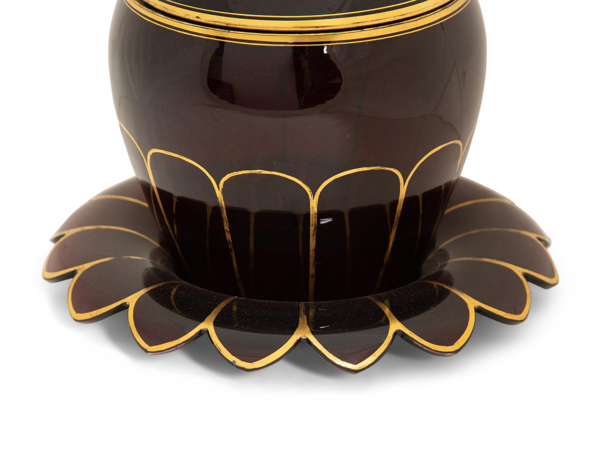 A Bohemian Gilt Decorated Ruby Glass Punch Bowl, Cover and Underplate