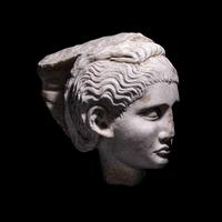 A Roman Marble Relief with a Female Head