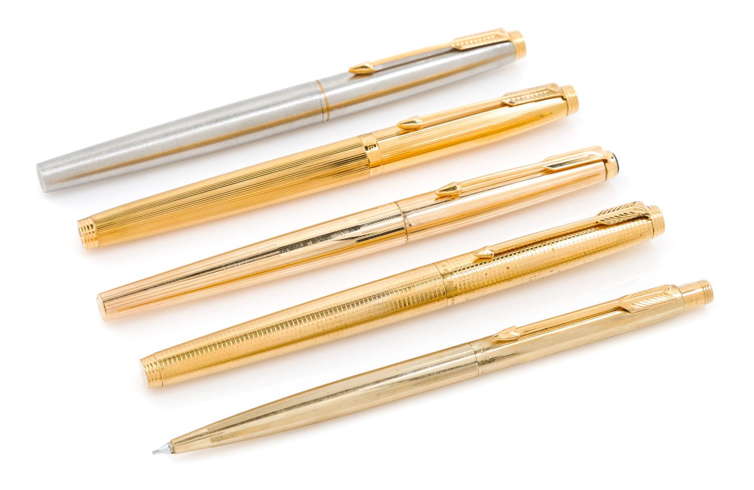 A Group of Four Parker Fountain Pens Length of longest 5 1/8 inches.