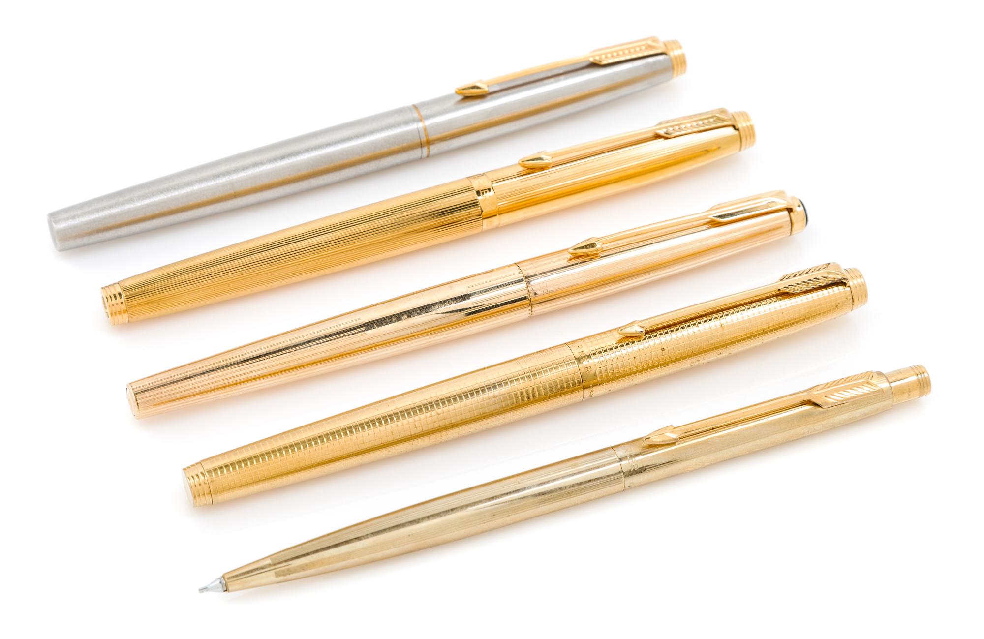 A Group of Four Parker Fountain Pens Length of longest 5 1/8 inches.