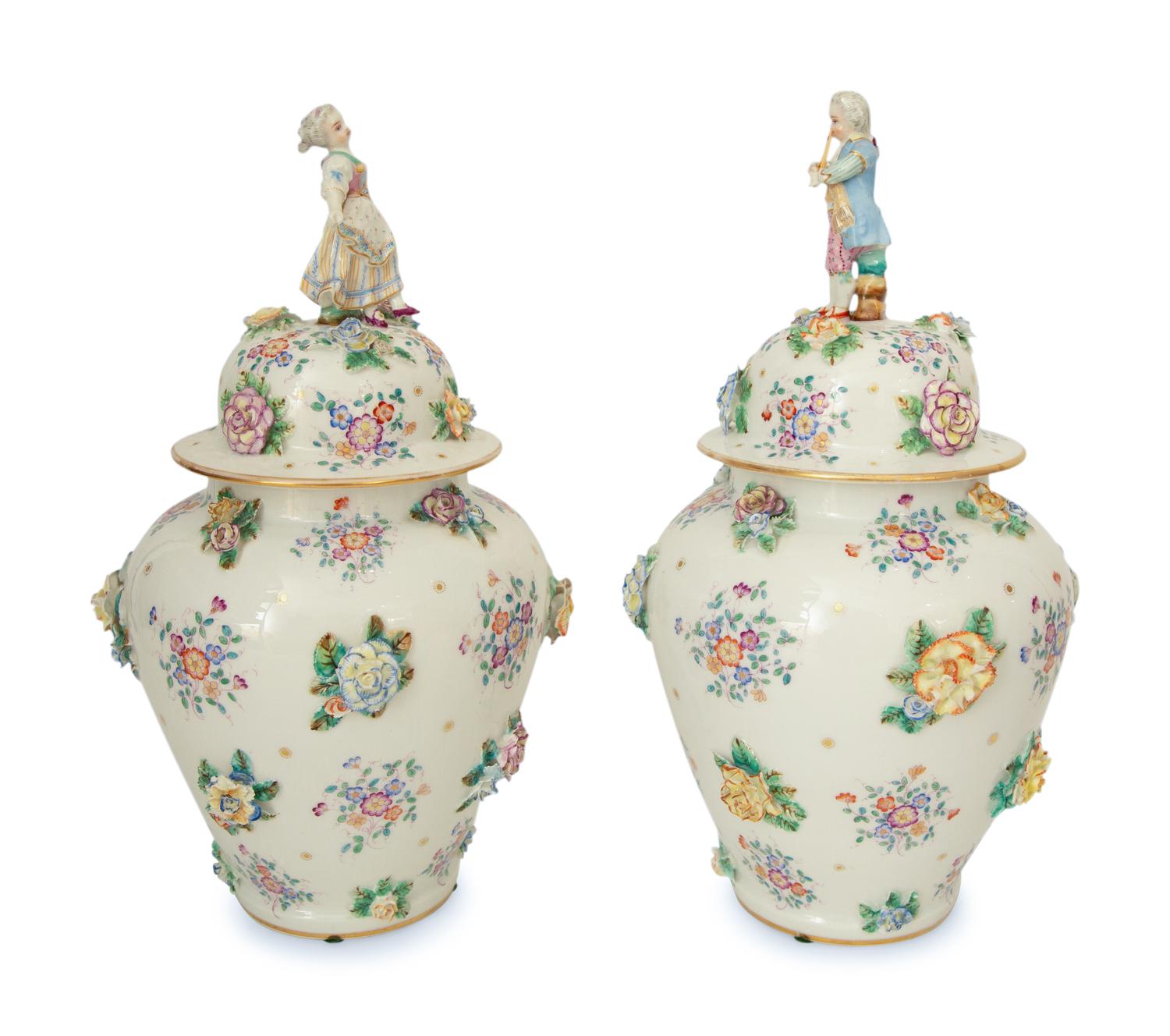 A Pair of Meissen Porcelain Covered Jars with Figural Finials