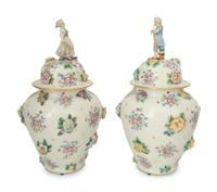A Pair of Meissen Porcelain Covered Jars with Figural Finials
