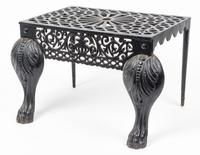 A Cast Iron Footman or Fireplace Bench Height 12 inches.