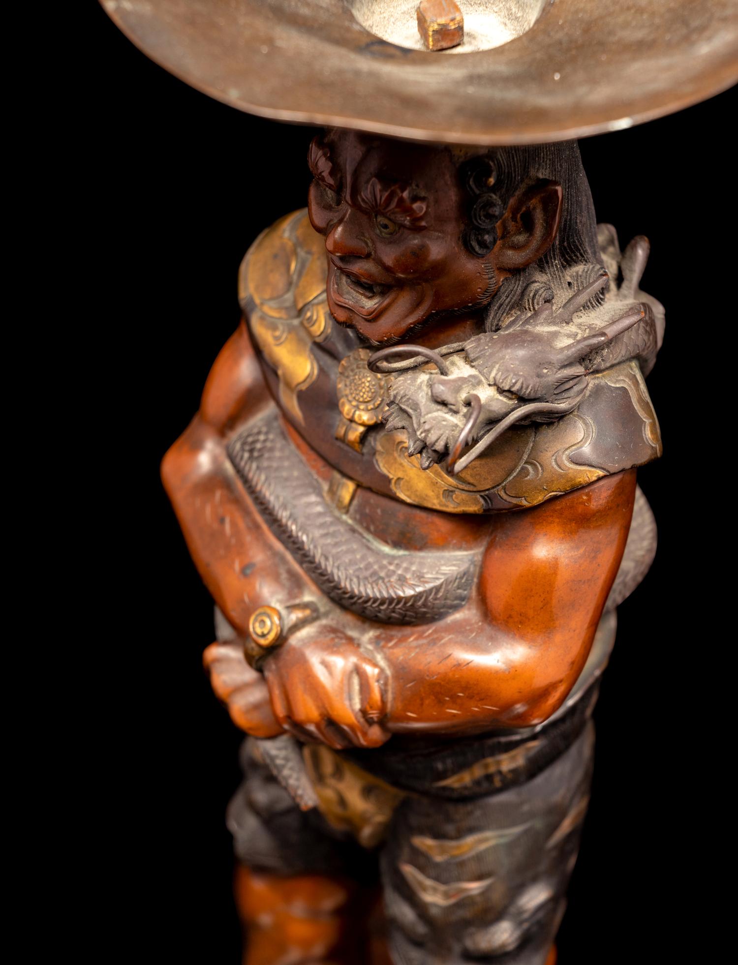 A Patinated and Gilt Bronze Figure of Oni