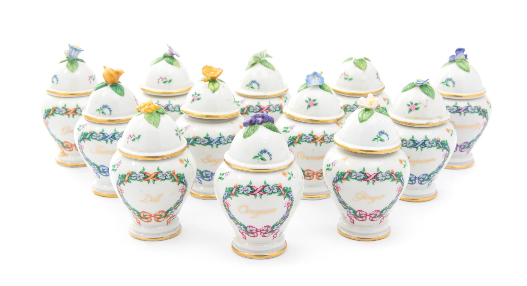 A Set of Twelve Franklin Mint Porcelain Spice Jars Height 4 inches
