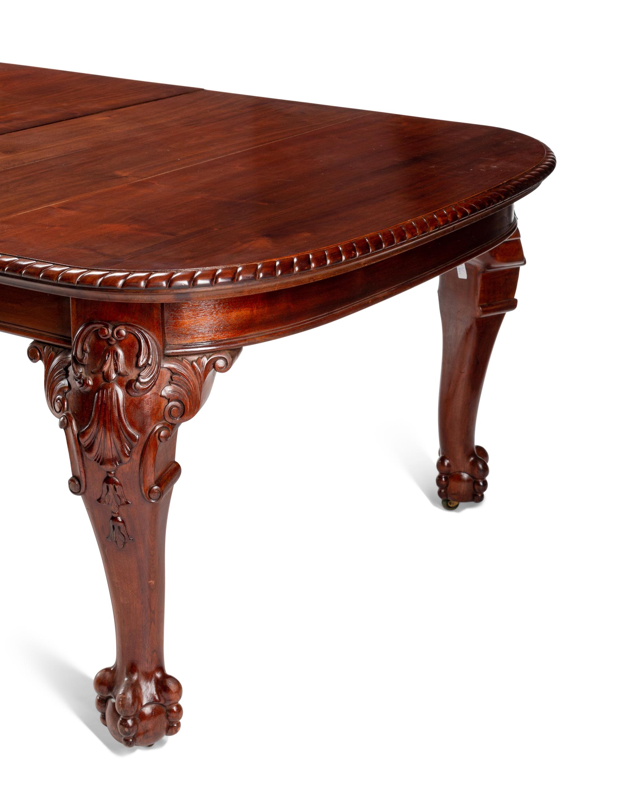 A George III Style Walnut Dining Table
