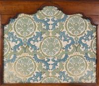 A Continental Walnut Panel Converted to a Headboard