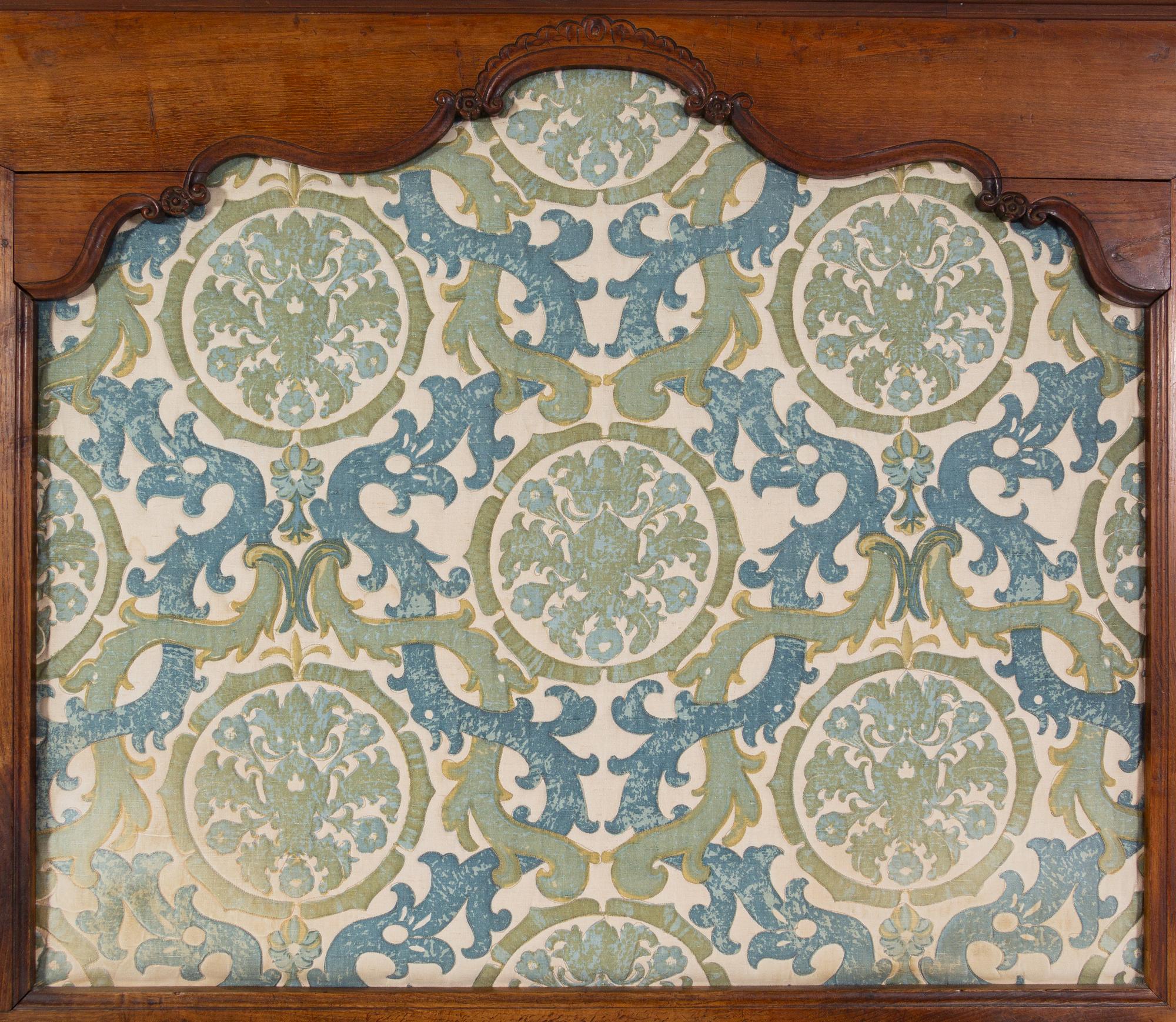 A Continental Walnut Panel Converted to a Headboard
