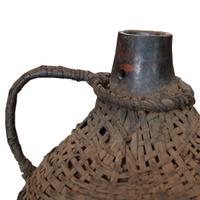 A Wood and Wicker Gourd Calabash 10" W x 10" D x 13" H — West Africa, 20th Century