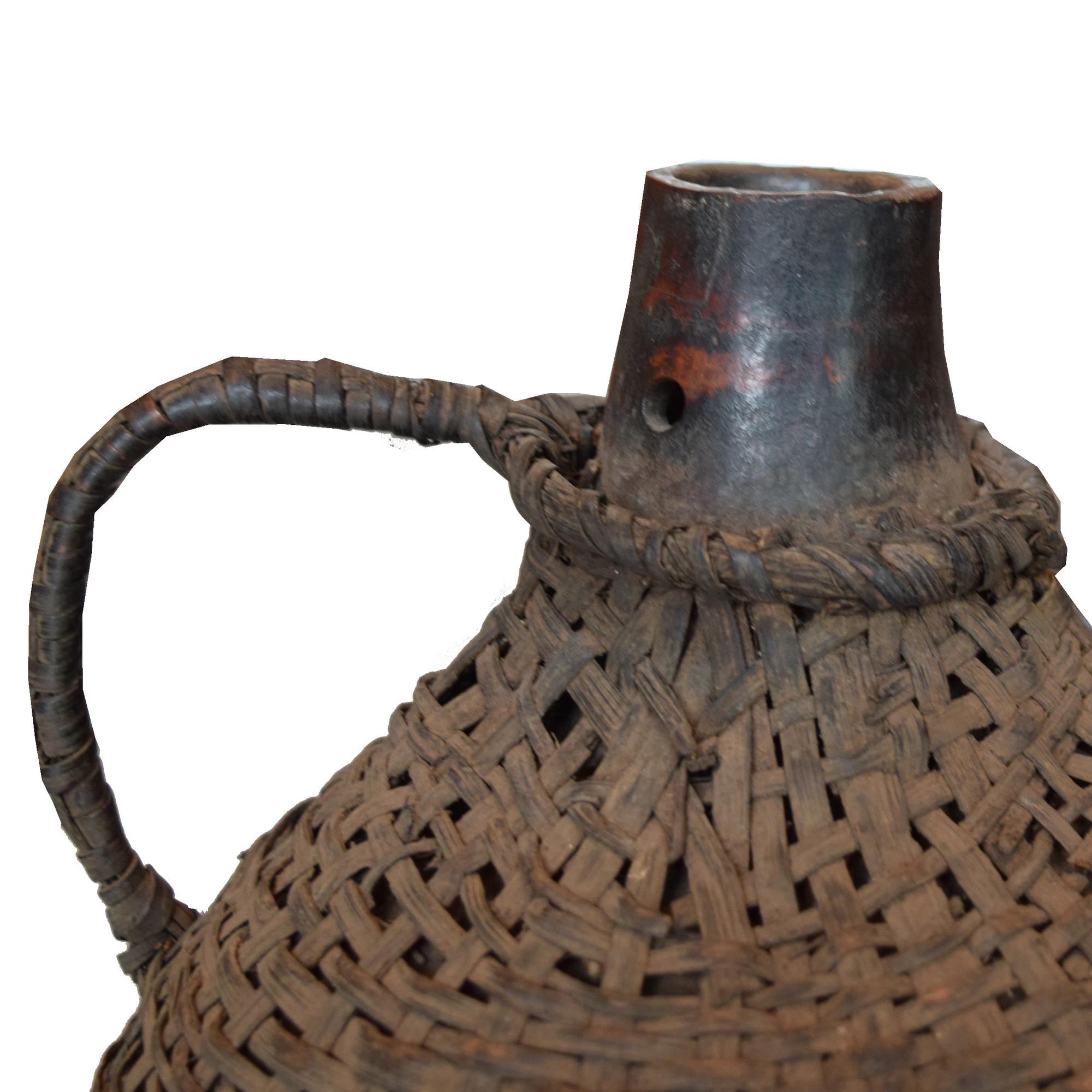 A Wood and Wicker Gourd Calabash 10" W x 10" D x 13" H — West Africa, 20th Century