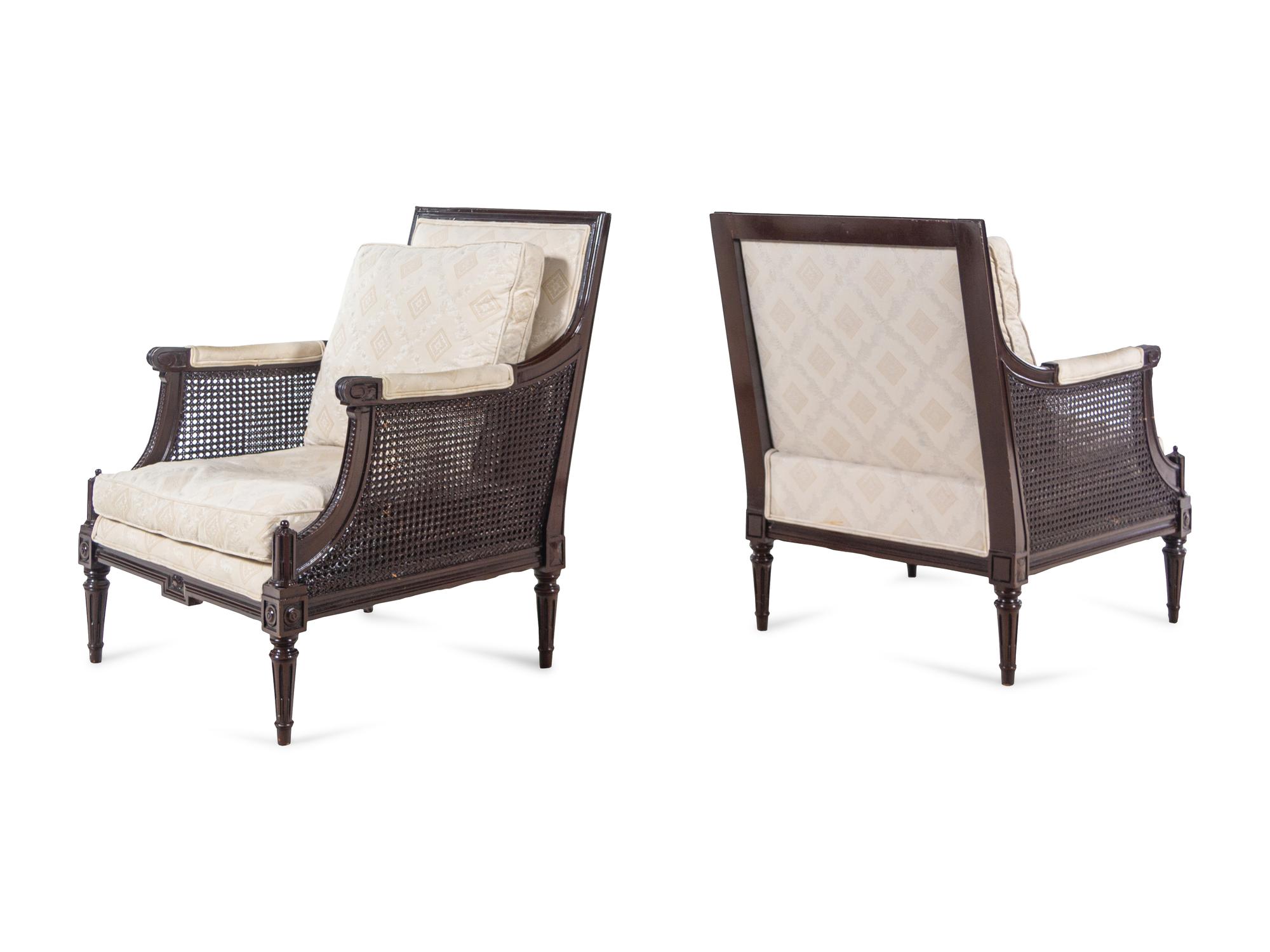 A Pair of Louis XVI Style Cane Upholstered Bergères