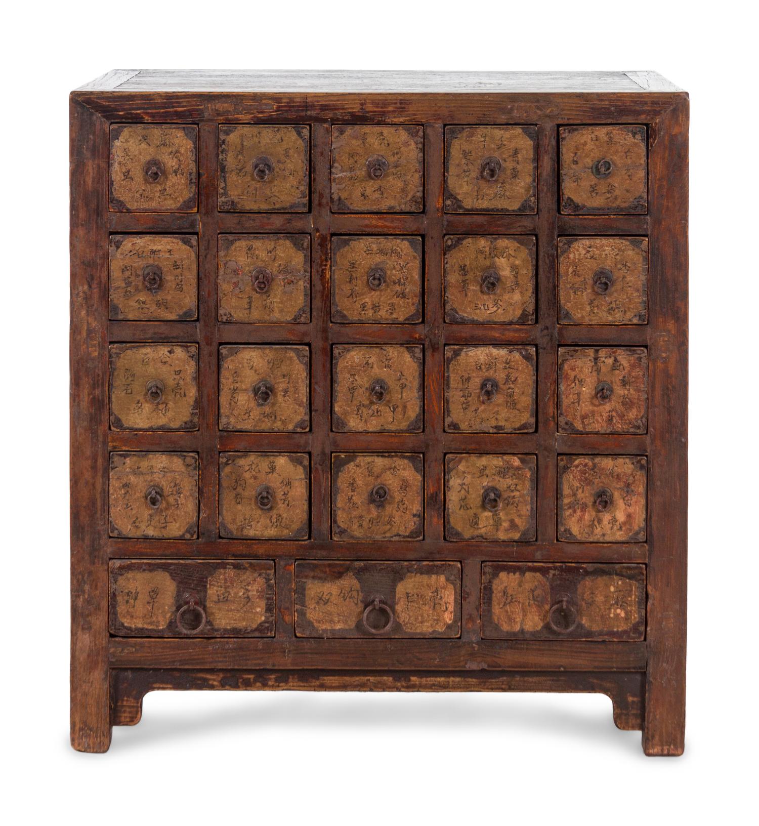 A Chinese Parcel Lacquered Elmwood Medicine Chest