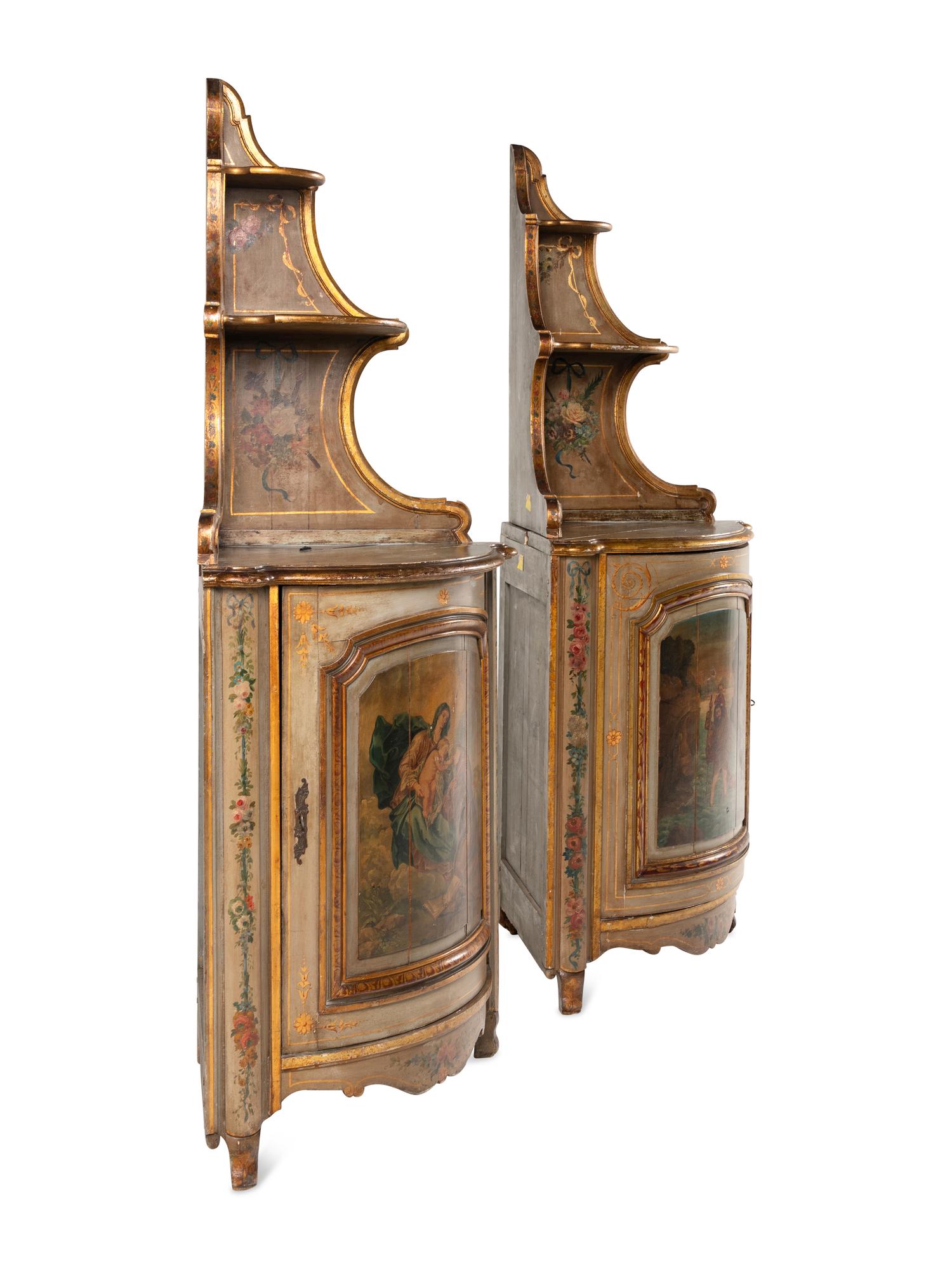 A Pair of French Painted Corner Cabinets