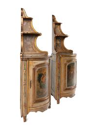 A Pair of French Painted Corner Cabinets