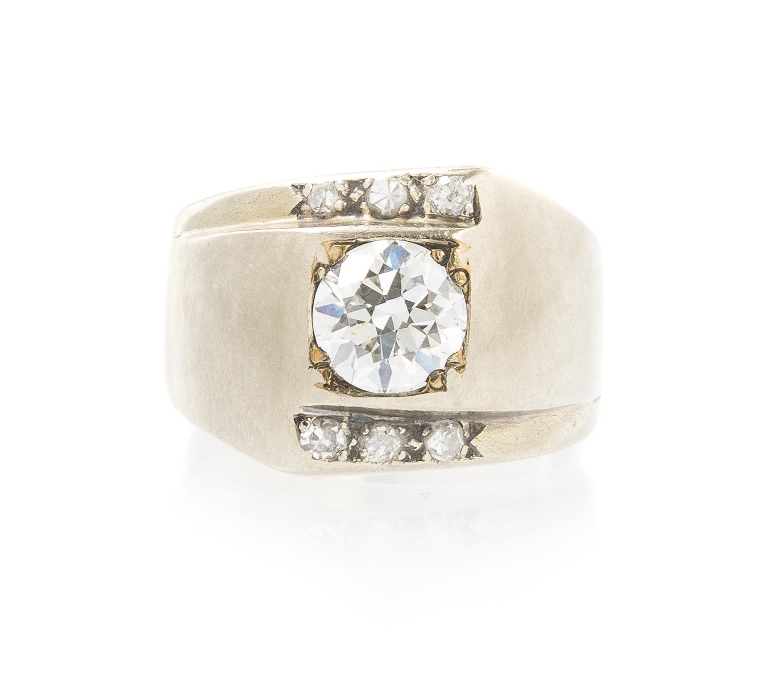 A 14 Karat White Gold and Diamond Ring, 4.60 dwts.