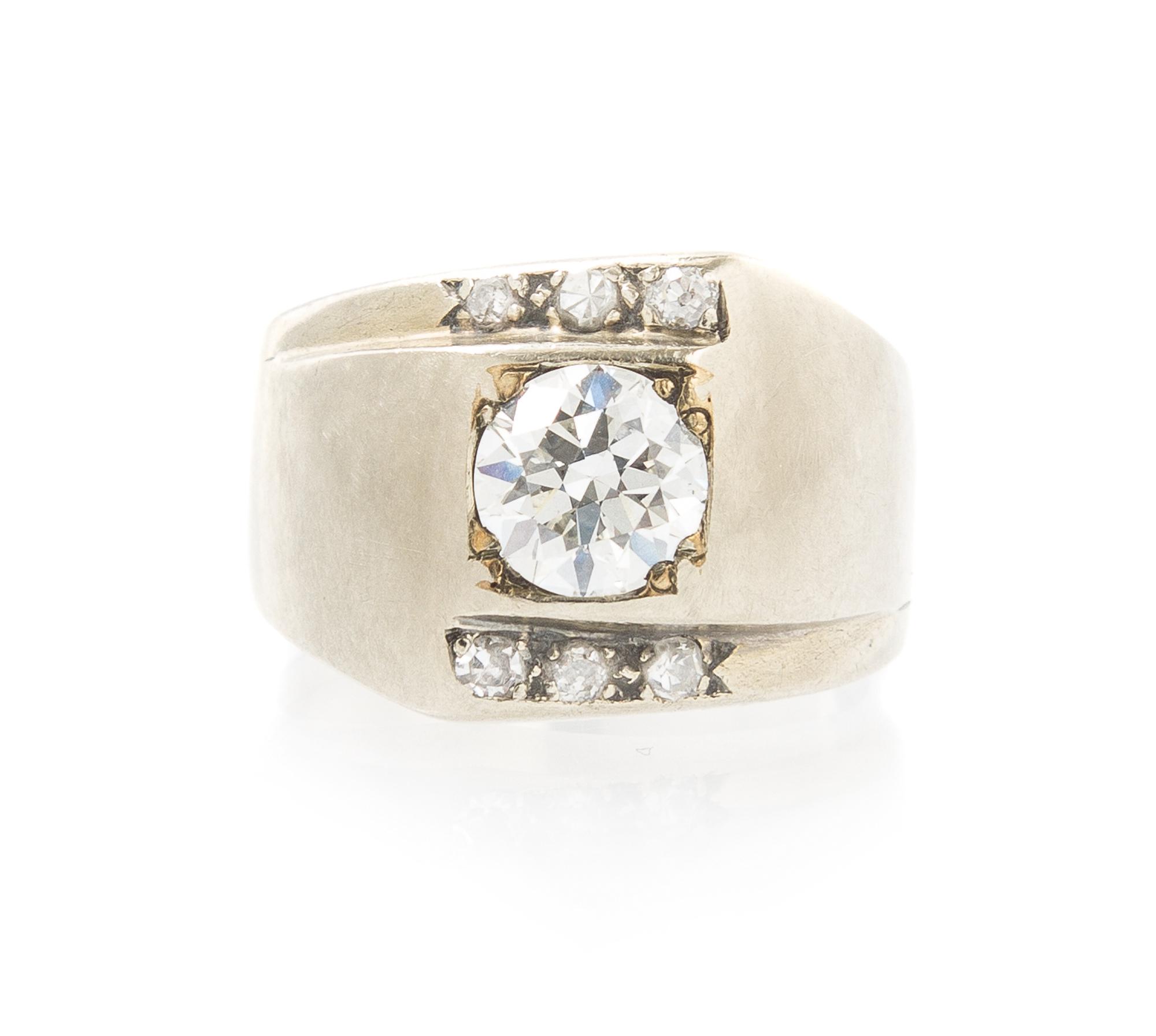 A 14 Karat White Gold and Diamond Ring, 4.60 dwts.